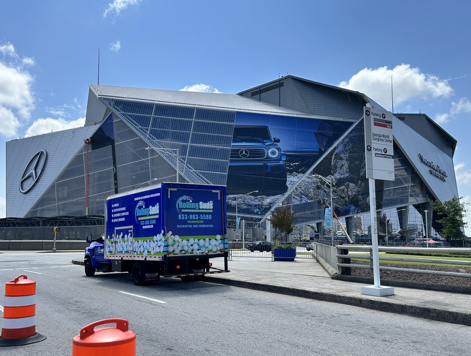 Rolling Suds crews washing Mercedes-Benz Stadium